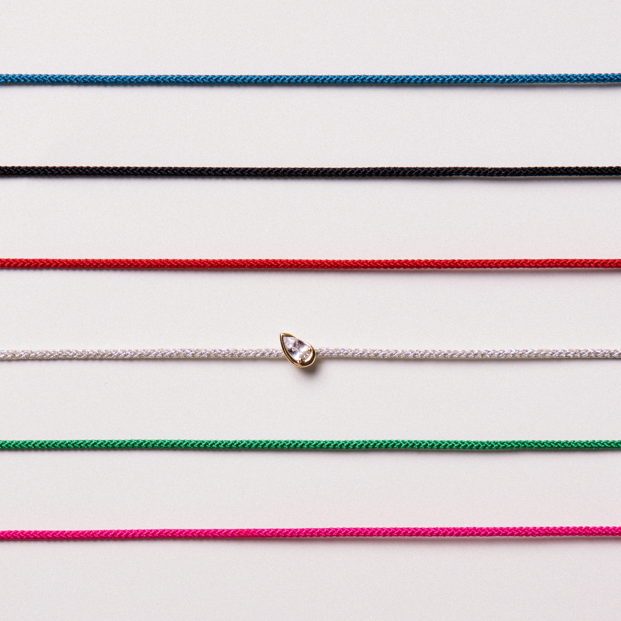 BB THELMA WHITE SAPPHIRE CORD BRACELET