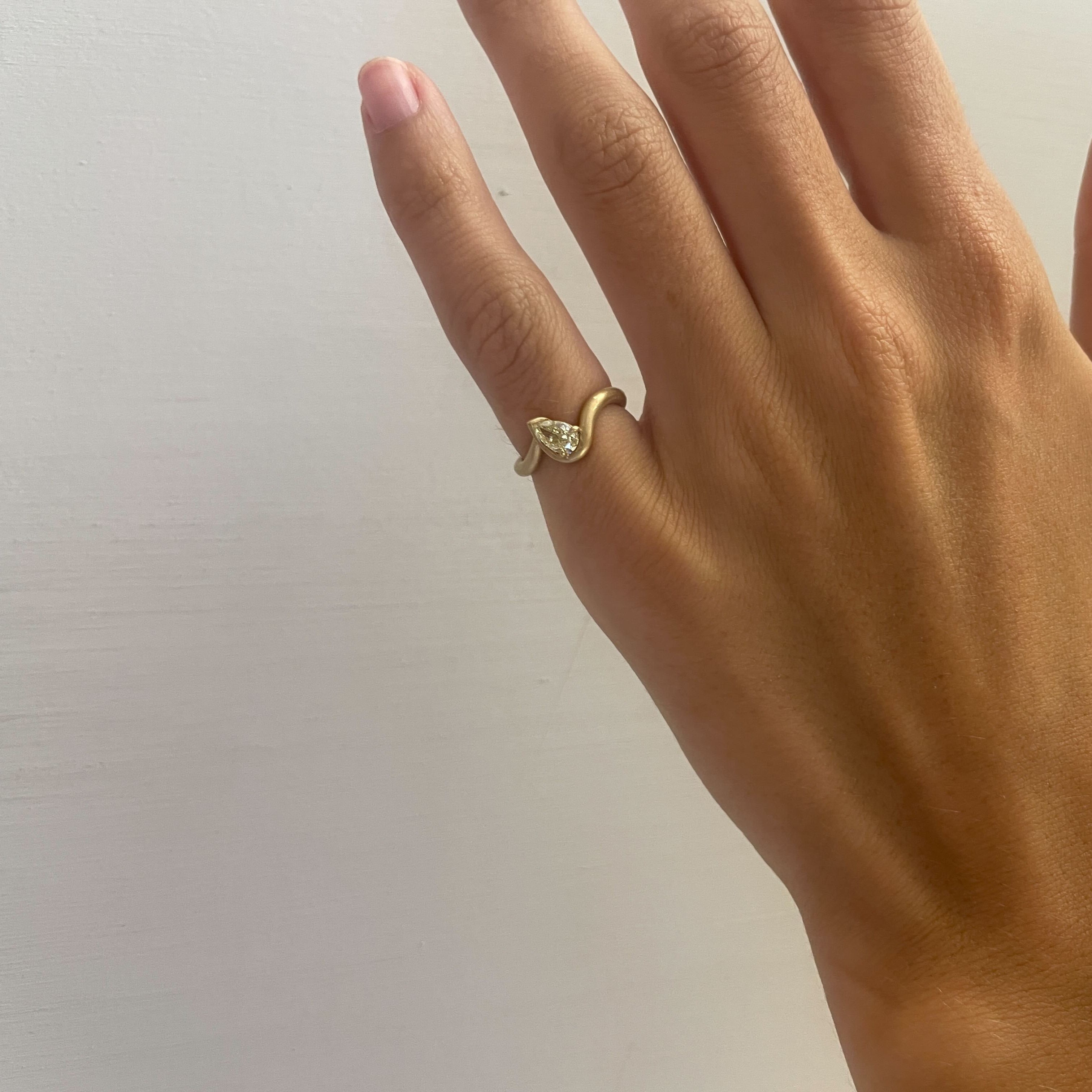 BB Thelma yellow diamond pinky ring on hand, 14k yellow gold