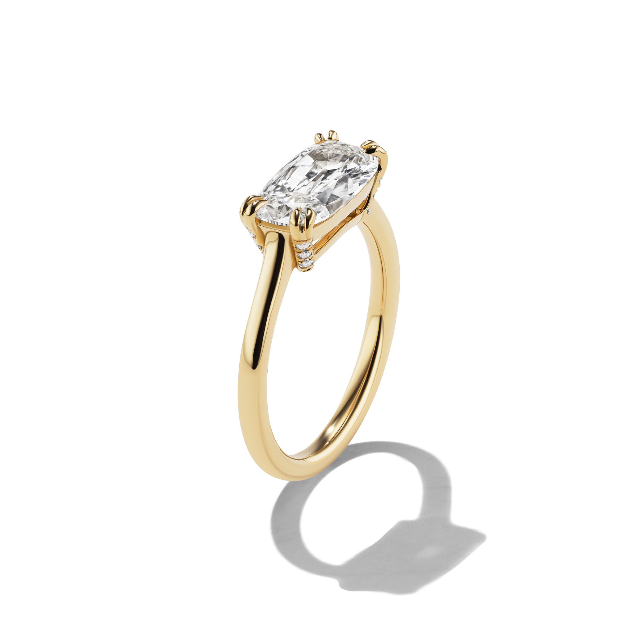 Faena 18kt Yellow Gold East-West Engagement Ring with pavé detail on basket - side view