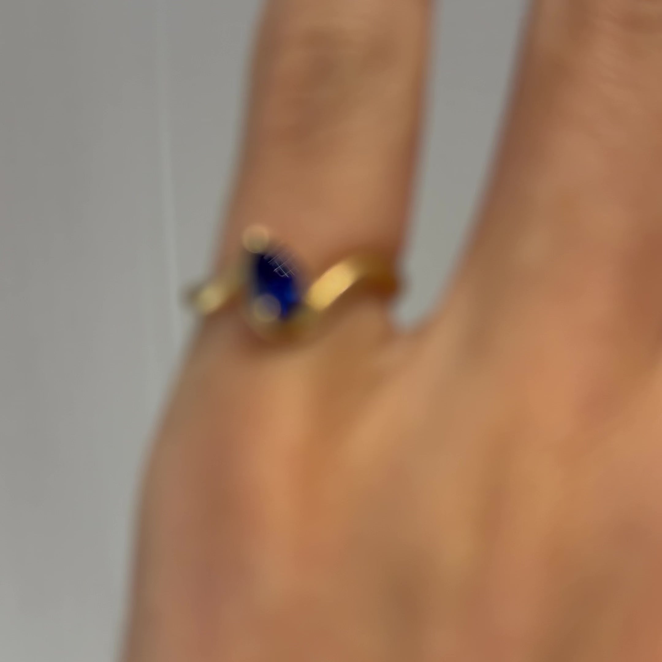BB Thelma Blue Sapphire pinky ring close up on model