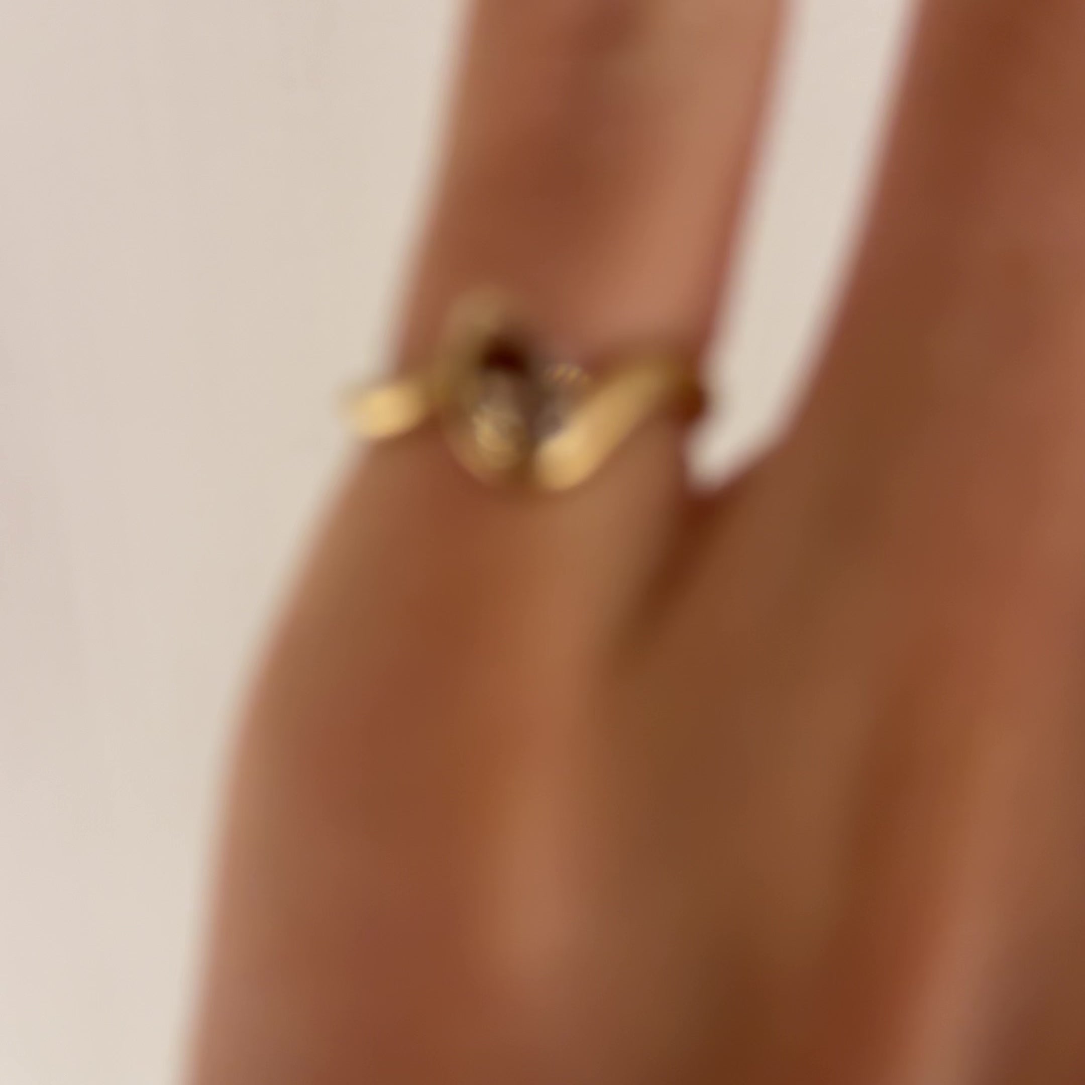 BB Thelma Brown diamond 14k yellow gold on hand close up