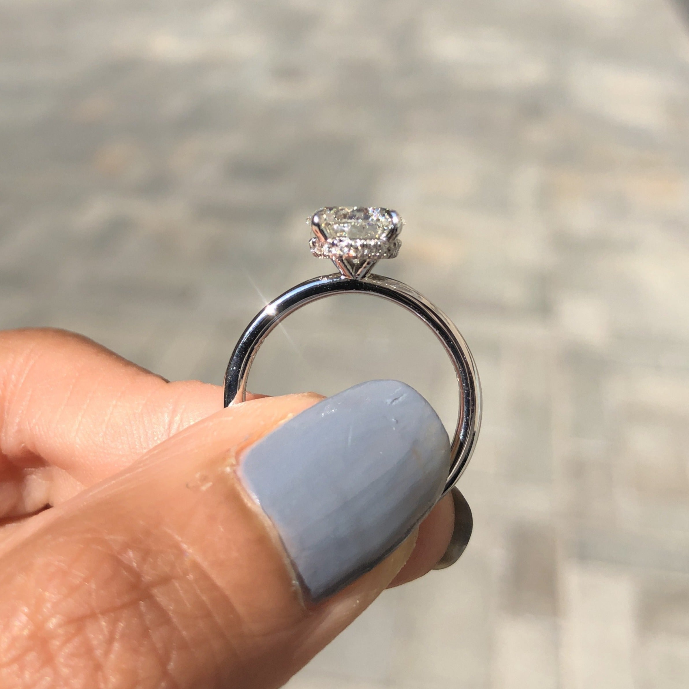 TRADITIONAL SOLITAIRE WITH A HIDDEN HALO