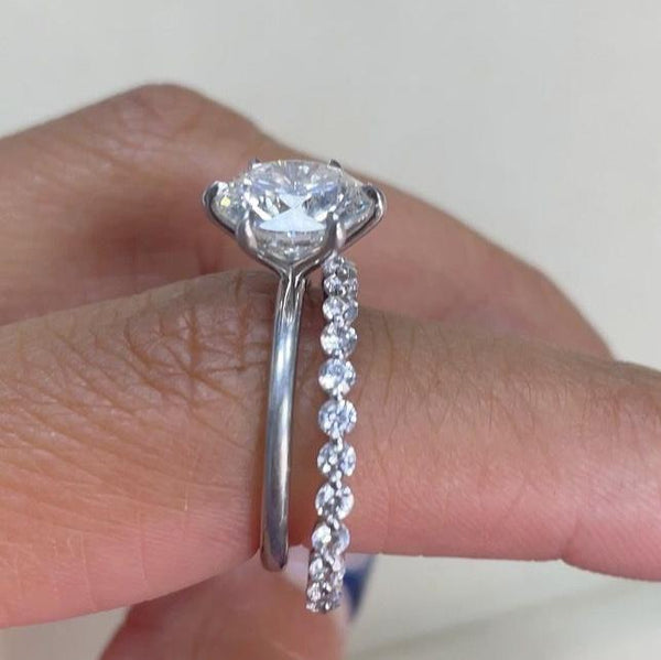 Round Cut Diamond Wedding Band, worn with engagement ring