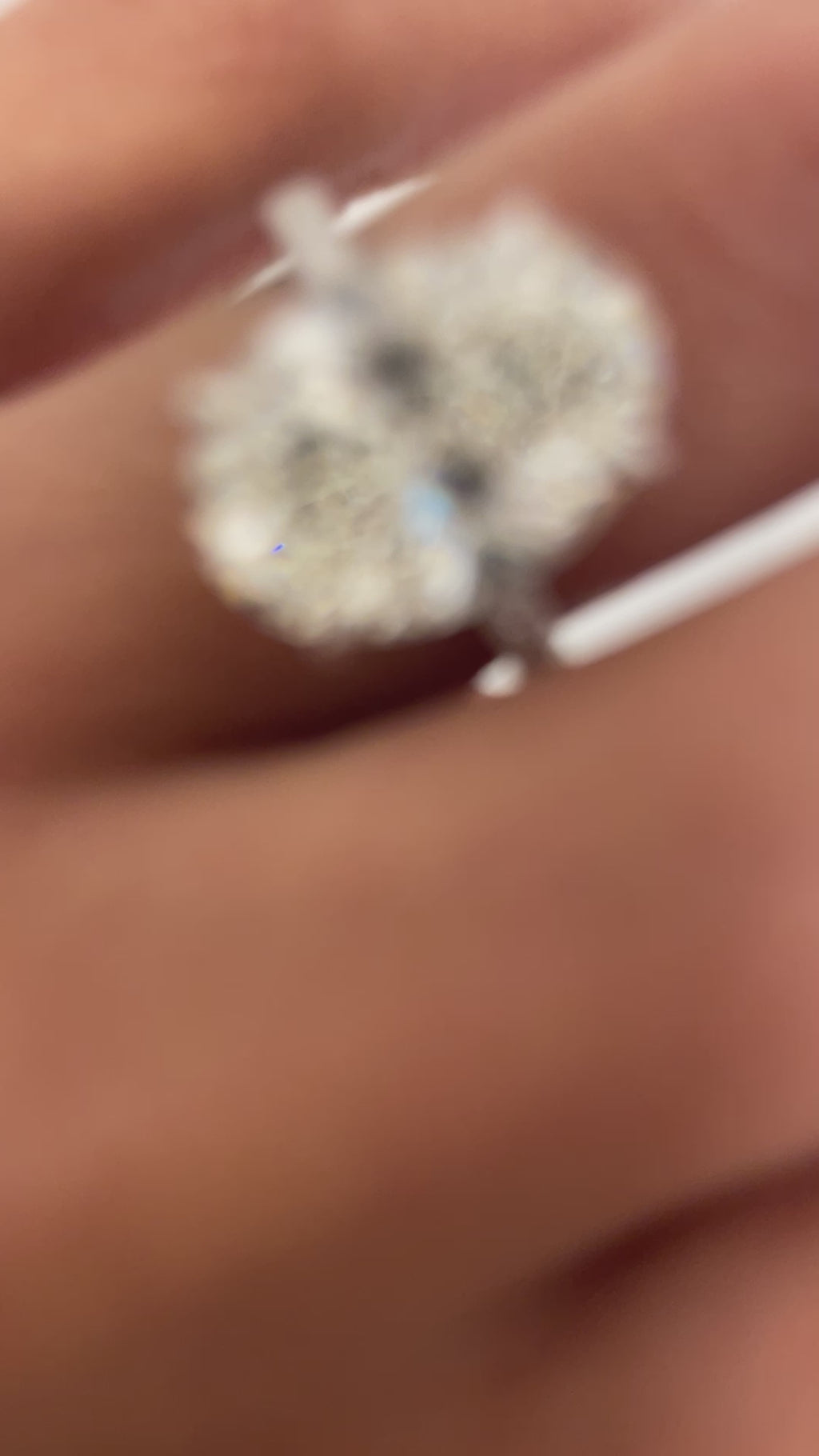 Oval Diamond with Pave Setting in Platinum on Hand